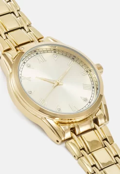 Pier OneKlocka - Gold-coloured 7 Pier OneKlocka - Gold-coloured -Pier One 2a532ca5882c4283a7c468abb17421c2 scaled