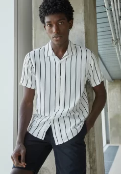 Pier One2 PACK - Skjorta - Black/white -Pier One e9850c2e54ca4eb6b01614842b047075 scaled